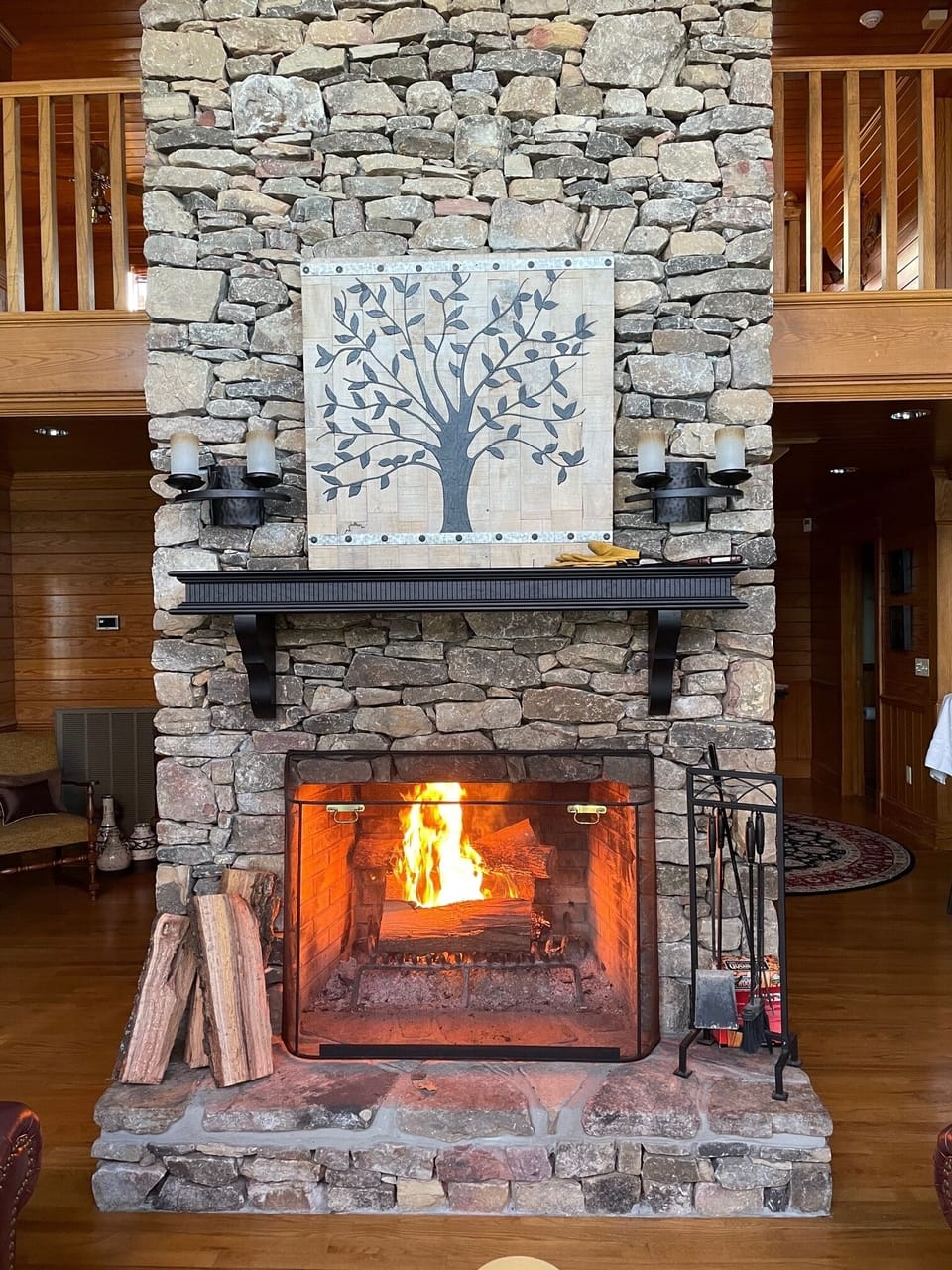 Large two story fireplace helps heat the entire home.