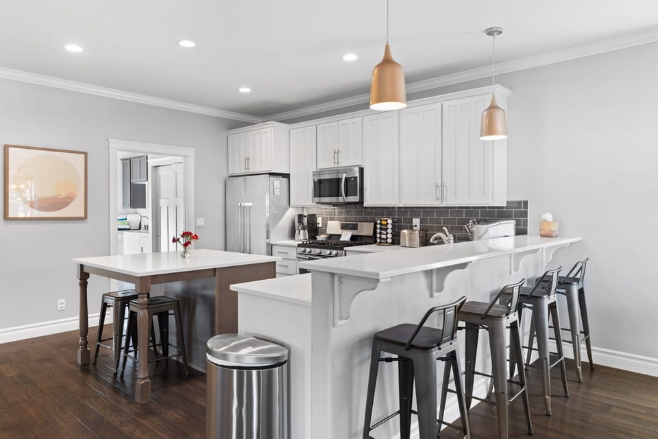 Kitchen- Through the door is the laundry room, back porch,  hot tub and more. 