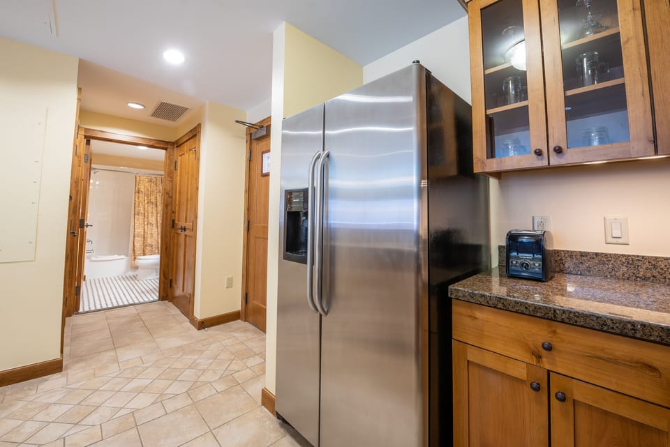 Condo, 1 Bedroom | Private kitchen | Fridge, oven, dishwasher, coffee/tea maker