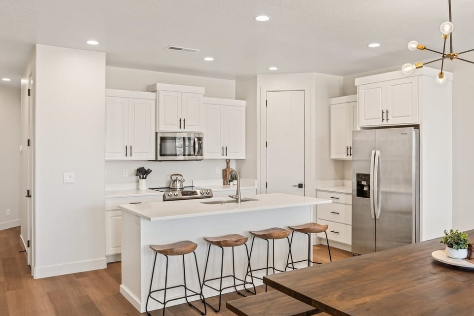 Townhome, 4 Bedrooms | Private kitchen | Fridge, oven, coffee/tea maker, toaster