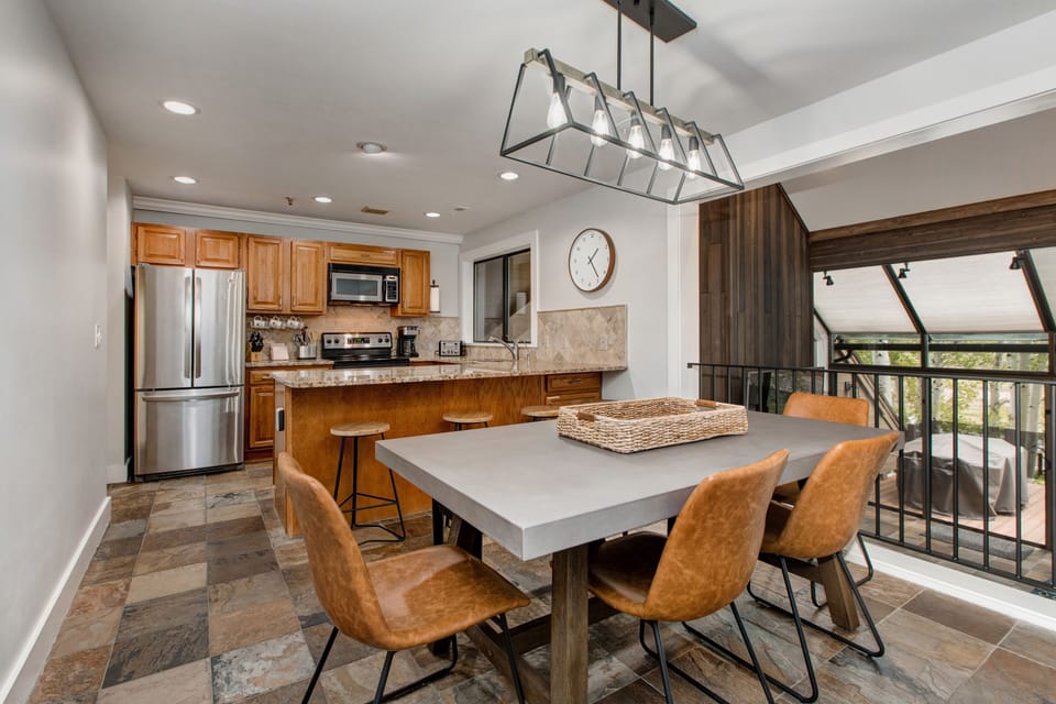 Main Level fully equipped kitchen and dining area