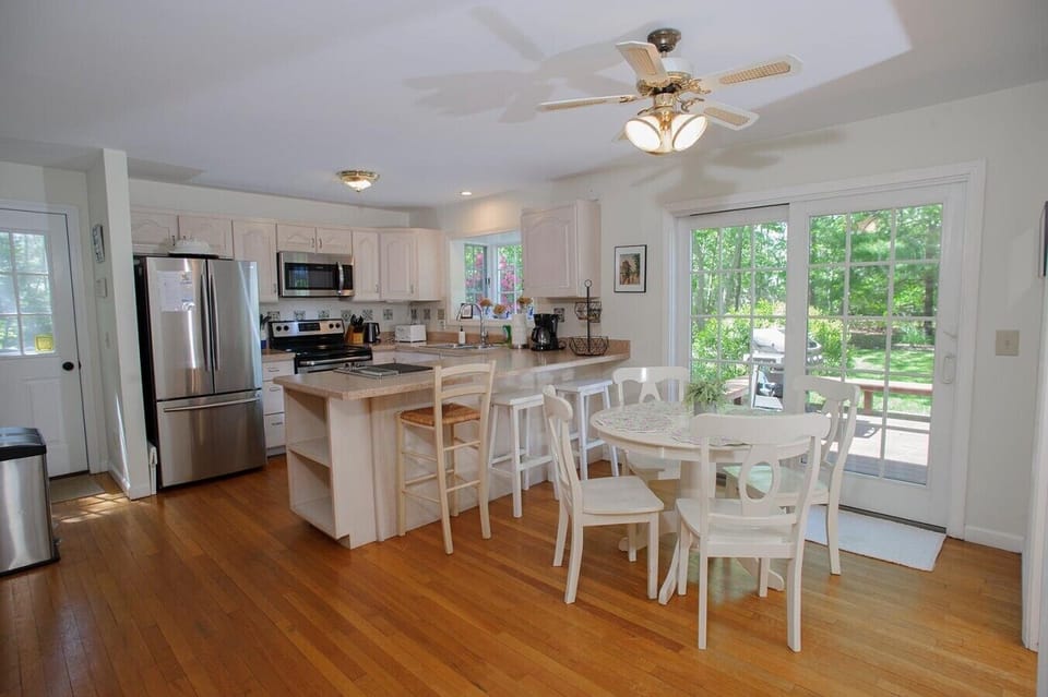 Modern combined kitchen and dining area ideal for everyday meals and bonding.