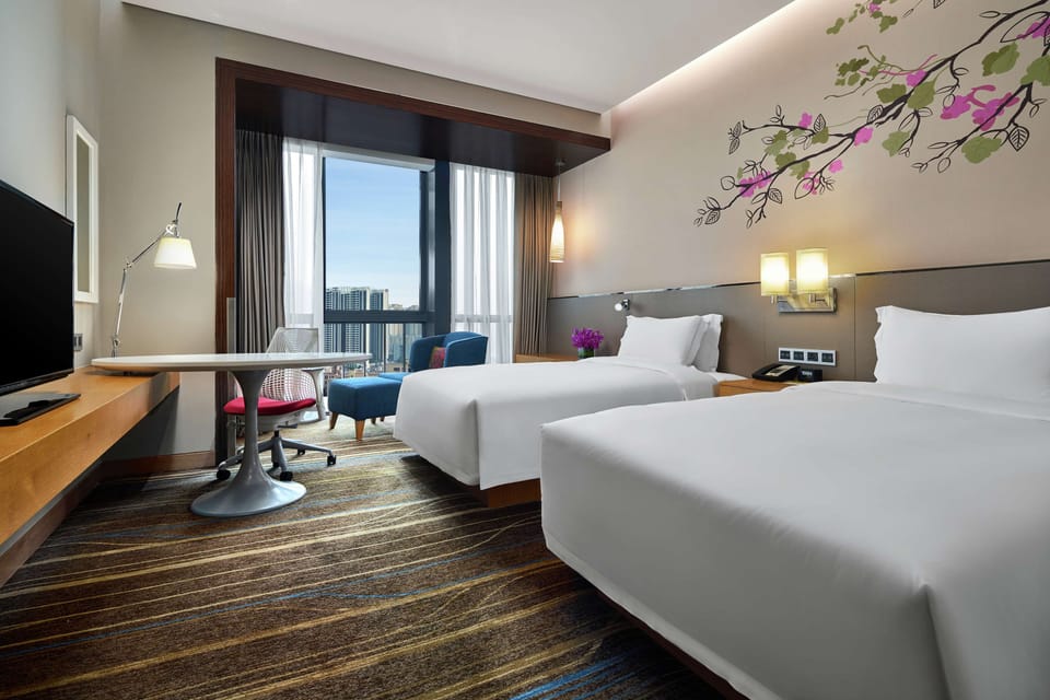 Premium bedding, pillowtop beds, in-room safe, blackout drapes