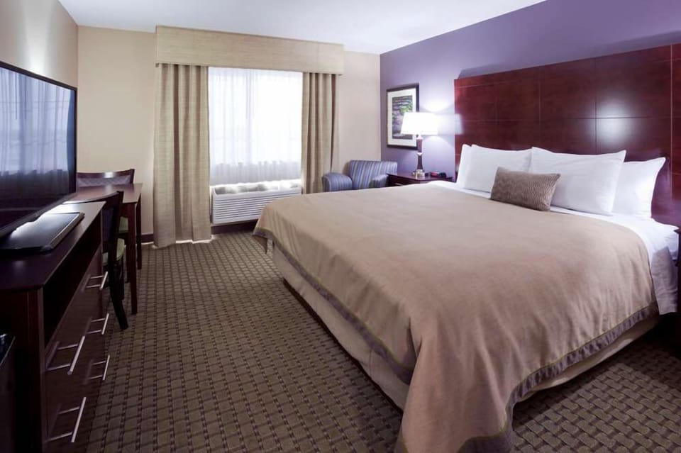 Premium bedding, desk, blackout drapes, iron/ironing board