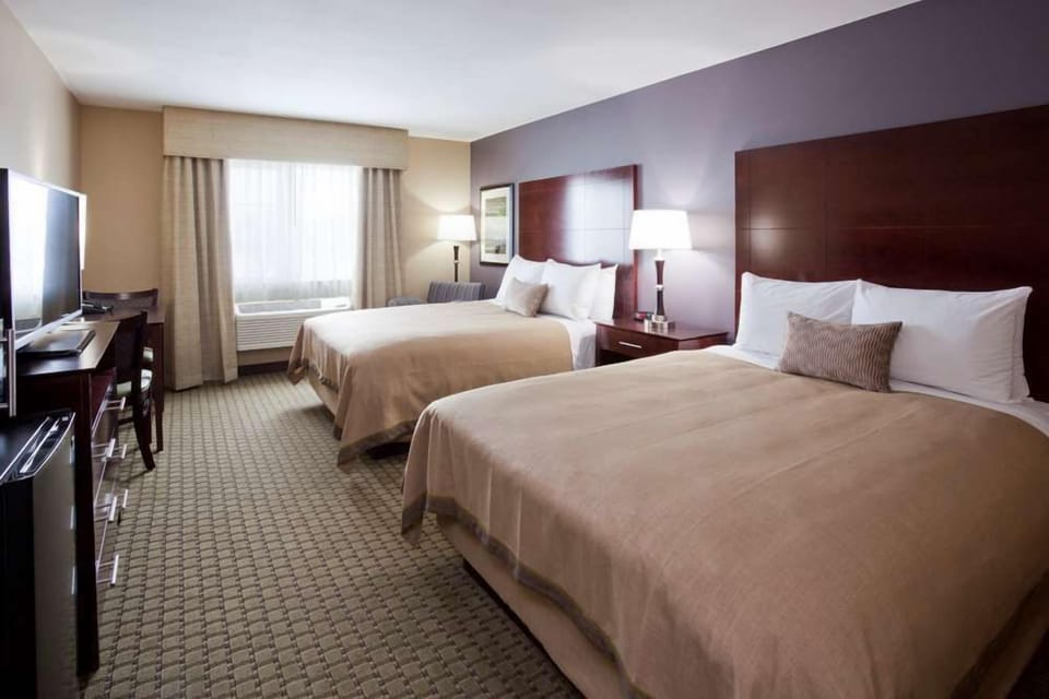 Premium bedding, desk, blackout drapes, iron/ironing board
