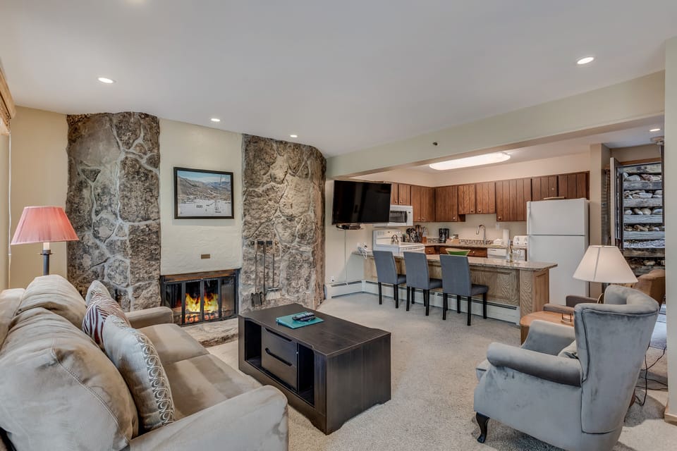 Living room with wood-burning fireplace