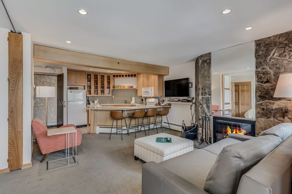 Living room with wood-burning fireplace