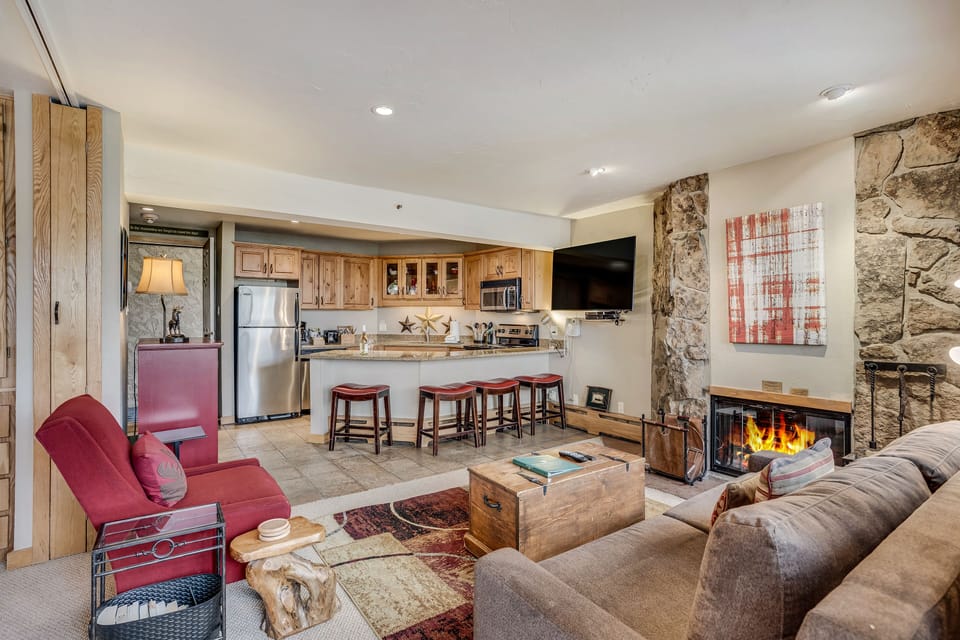 Living room with wood-burning fireplace