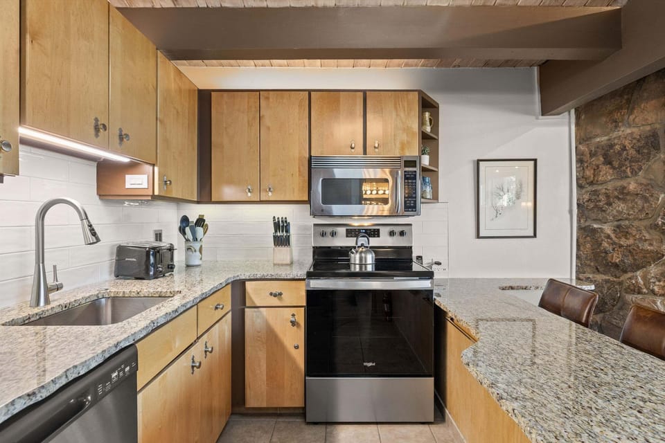 Renovated kitchen with counter seating