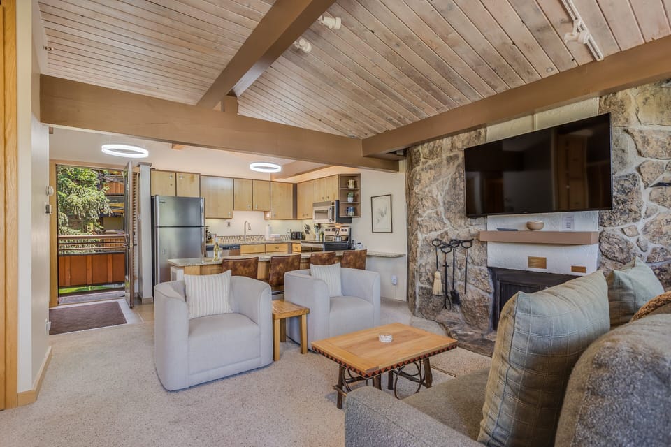 Living room with wood-burning fireplace
