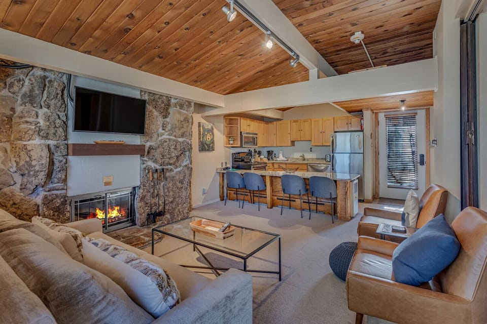 Living room with wood-burning fireplace