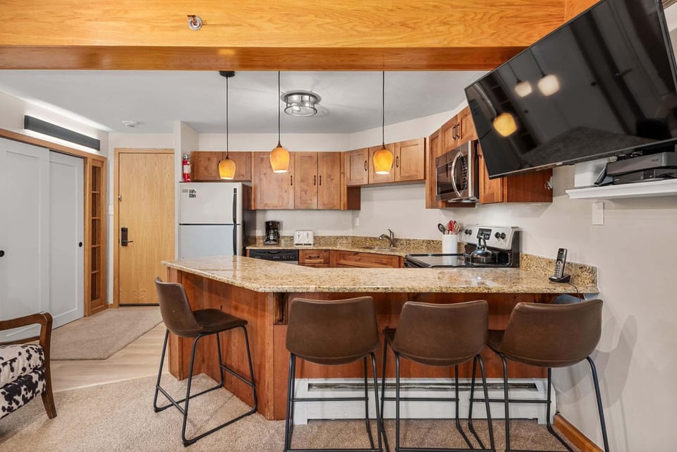 Remodeled kitchen with counter seating