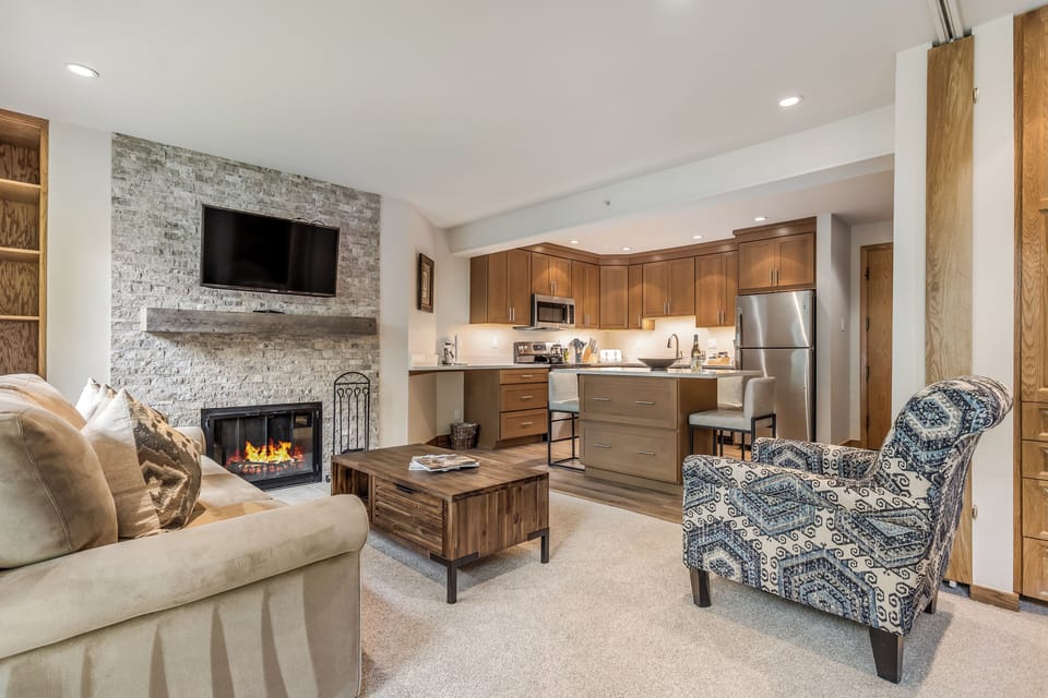 Living room with wood-burning fireplace