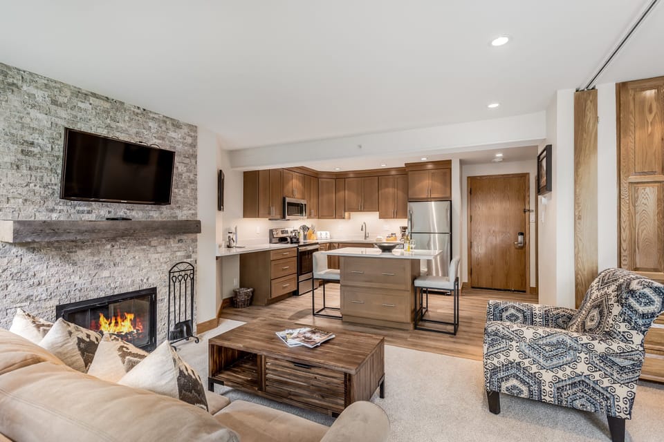 Living room with wood-burning fireplace