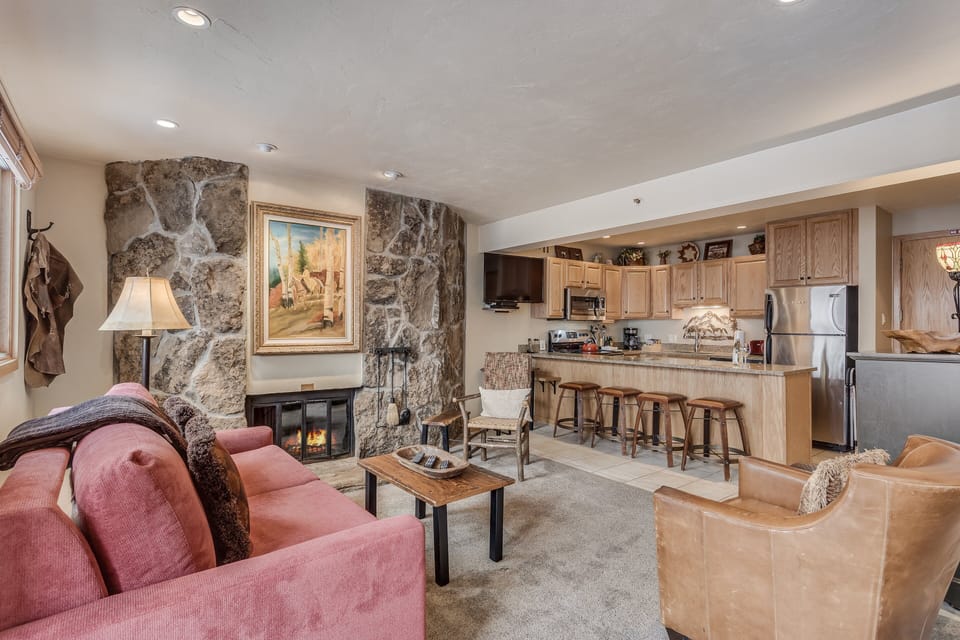 Living room with wood-burning fireplace