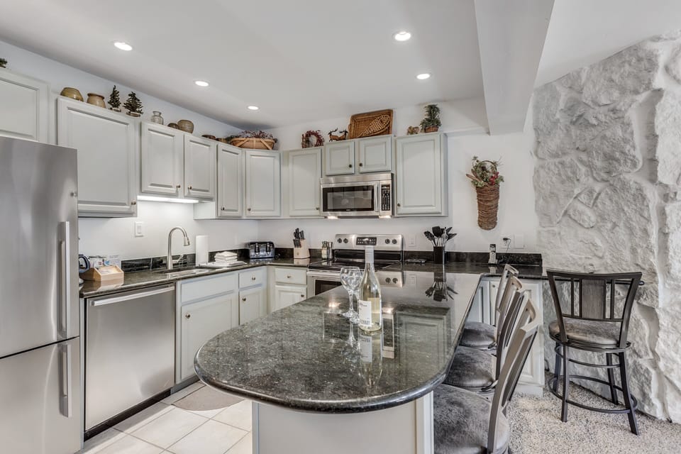 Full kitchen with bar seating