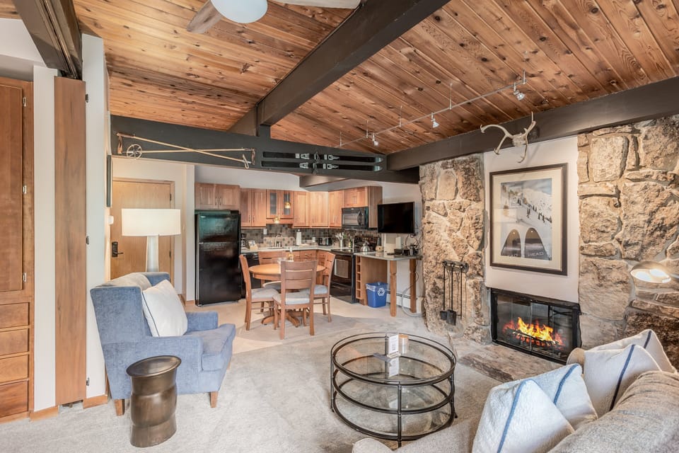 Living room with wood-burning fireplace