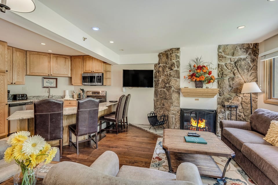 Living room with wood-burning fireplace