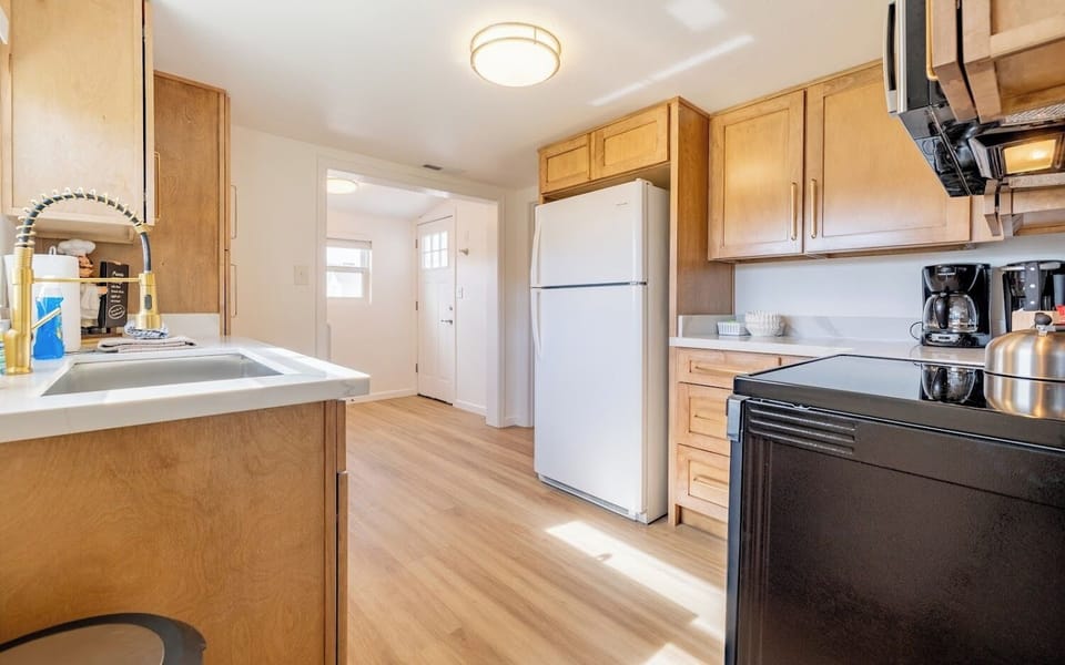 Newly remodeled kitchen has modern appliances for added convenience