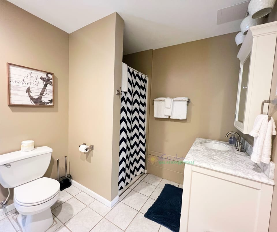 Downstairs bathroom. - Downstairs bathroom.