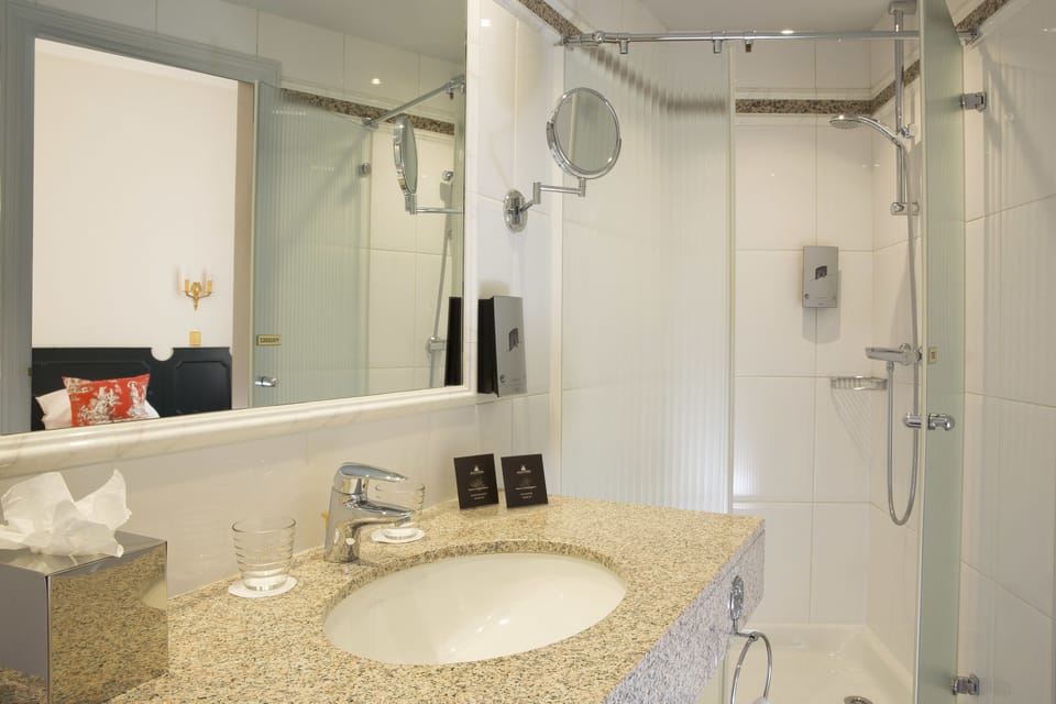 Combined shower/tub, eco-friendly toiletries, hair dryer, towels