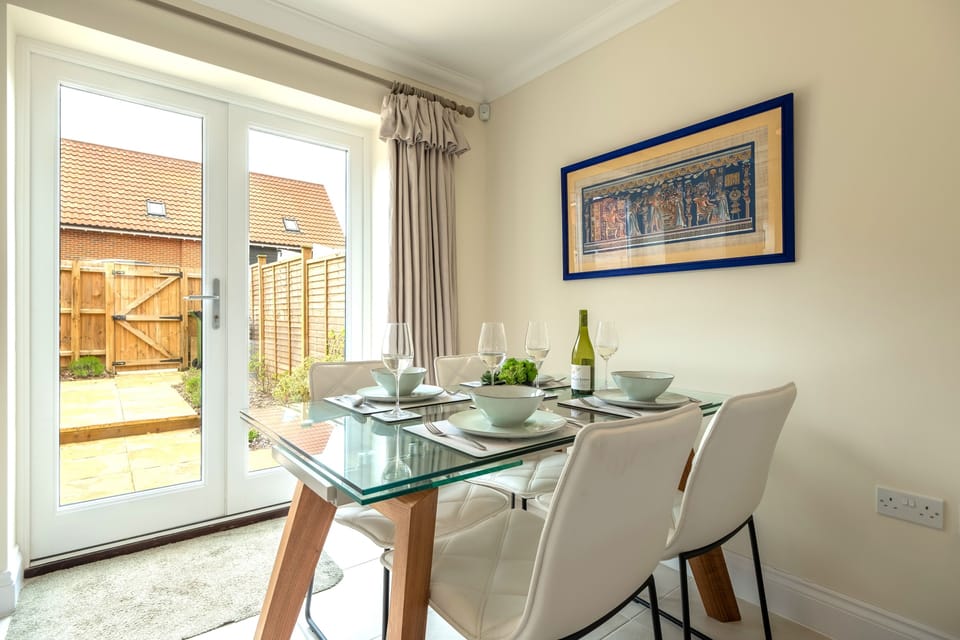 Ground floor: Dining area with french doors to the garden