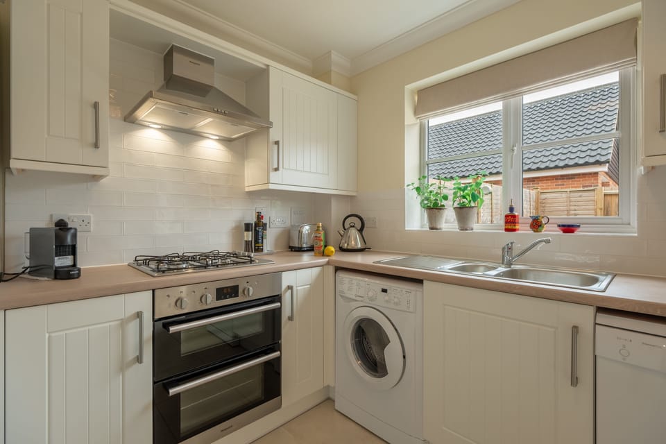 Ground floor: Well-equipped kitchen with gas cooker, fridge-freezer, dishwasher, washer-dryer and Nespresso coffee machine