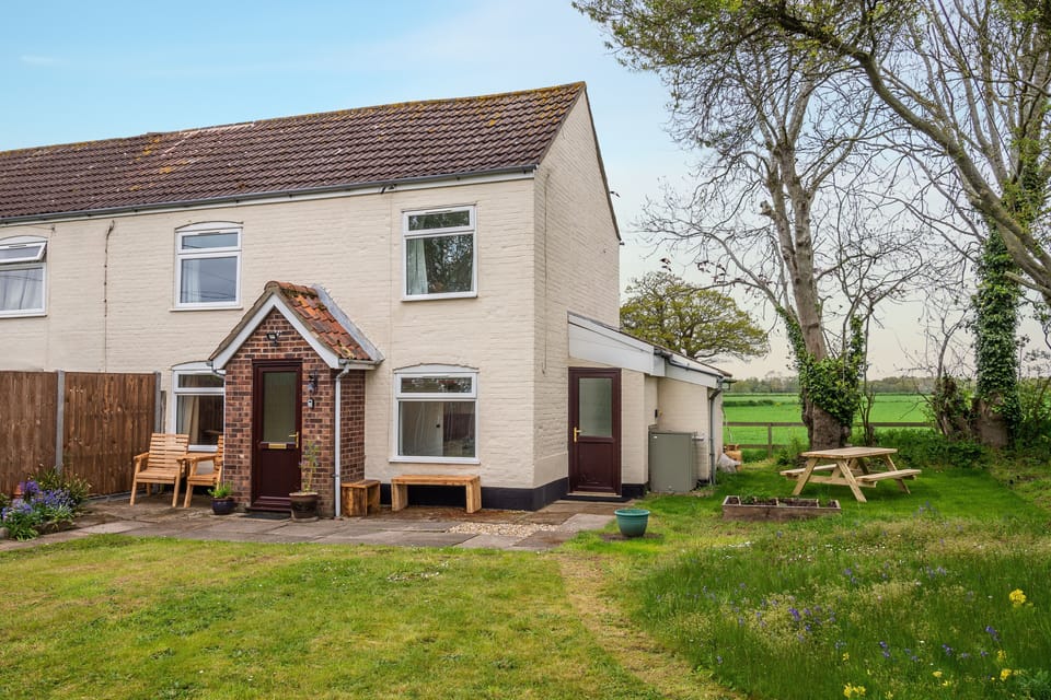 Margaret's cottage offers a choice of places to sit in the garden
