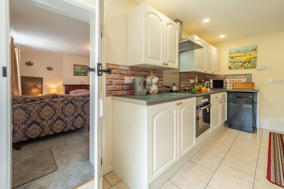 Ground floor: Kitchen with view back to sitting room