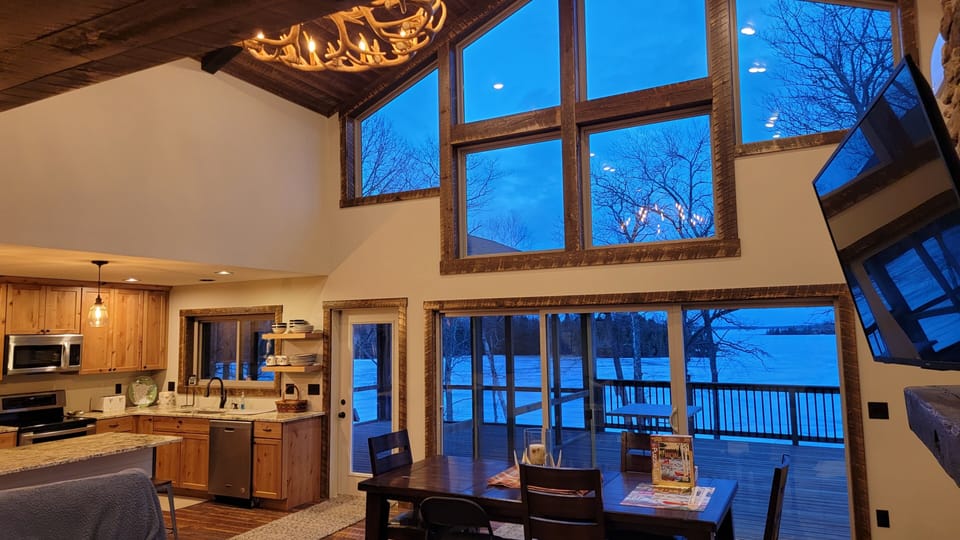 Cabin has 2 - 12' patio doors.  Windows overlook the long part of the lake.  