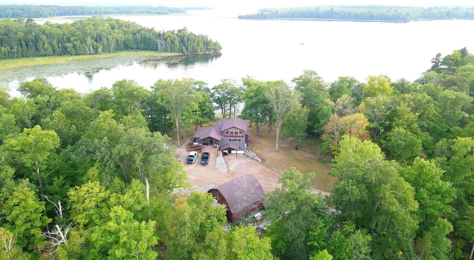 Cabin is angled to view 3 Bays into Woman Lake.  3 Sides are DNR land.  Private.