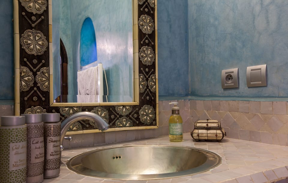 Shower, hair dryer, bathrobes, towels