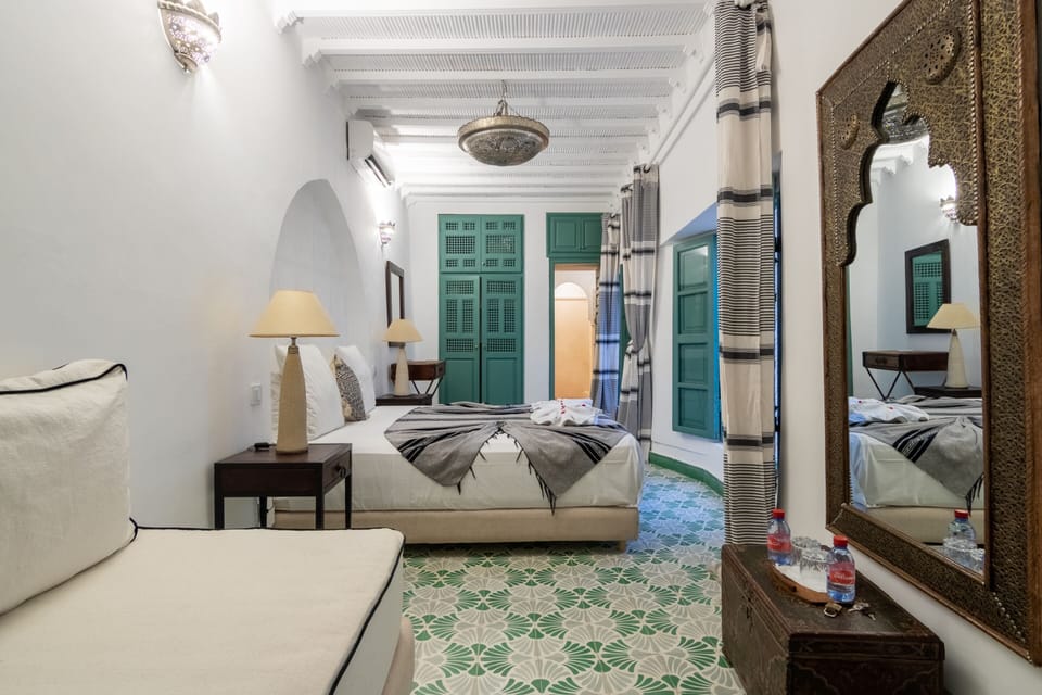 Suite, Private Bathroom | In-room safe, individually decorated, desk, blackout drapes