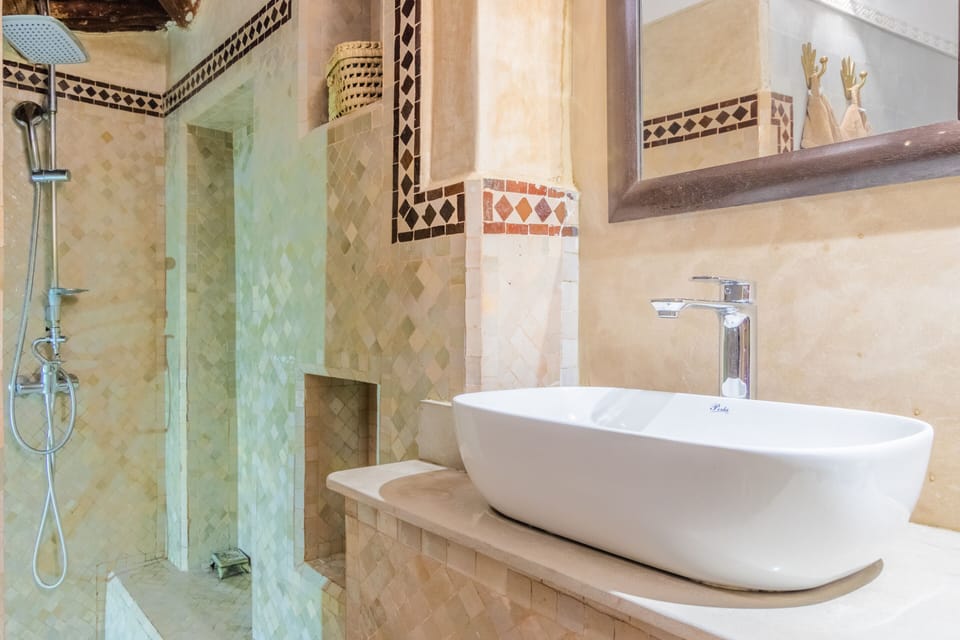 Suite, Private Bathroom | Bathroom | Shower, free toiletries, hair dryer, slippers
