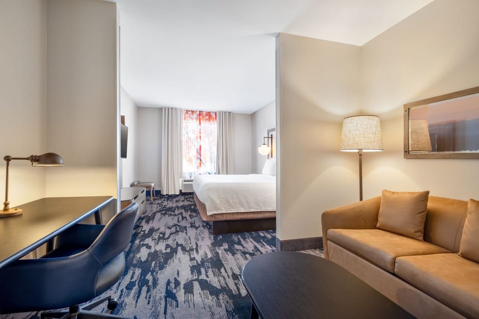 Suite, 1 King Bed with Sofa bed | Blackout drapes, iron/ironing board, free cribs/infant beds, free WiFi