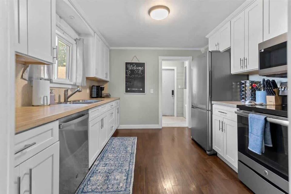 Fully equipped kitchen. Just past this is the laundry area, bathroom & main bedroom