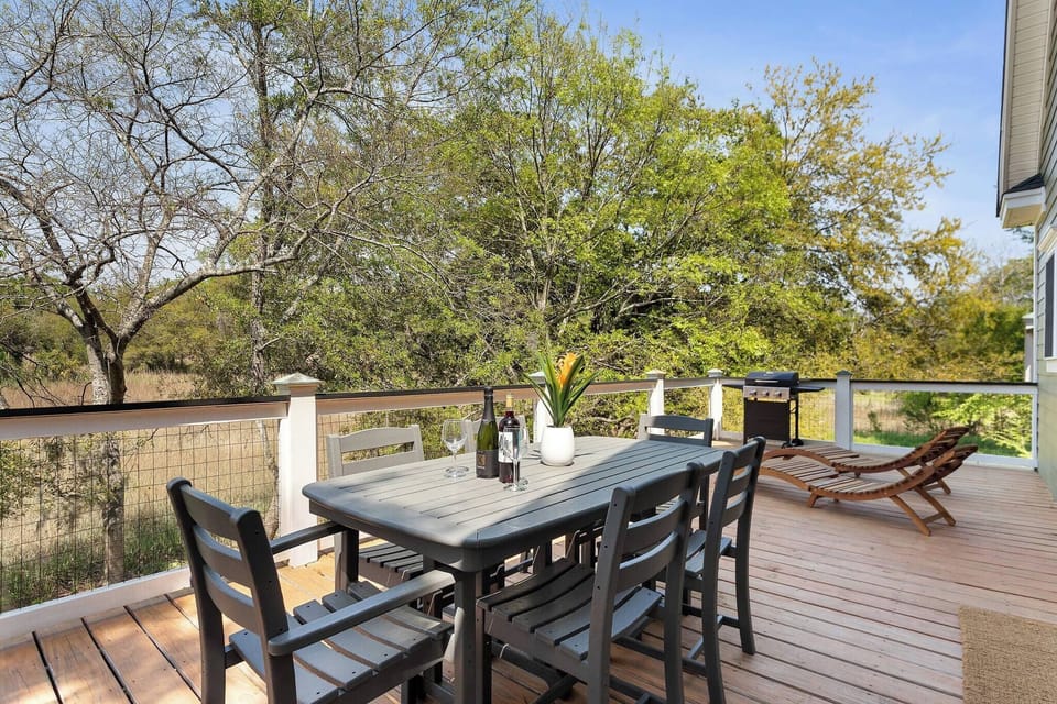 Porch dining overlooking the low-country marsh