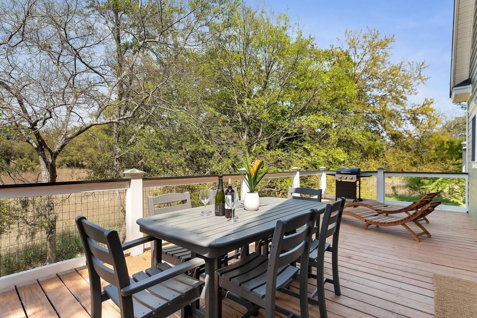 Porch dining overlooking the low-country marsh