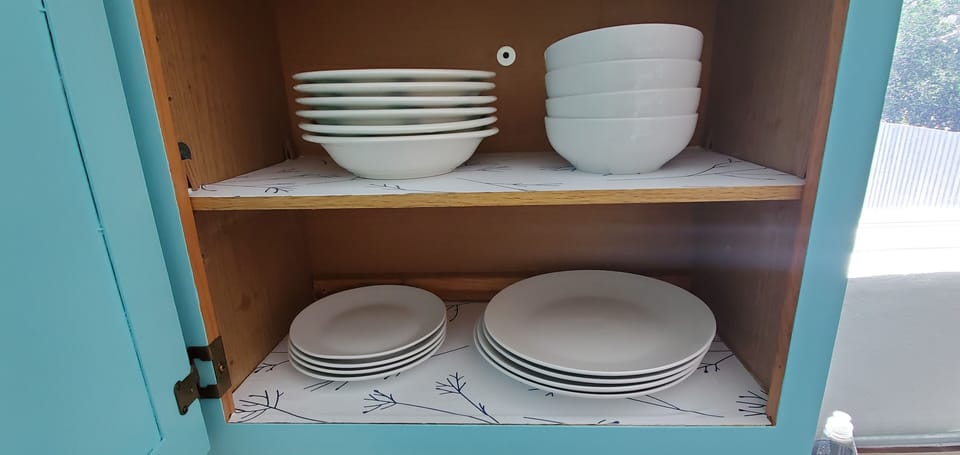 New dinnerware set with plates and bowls. 