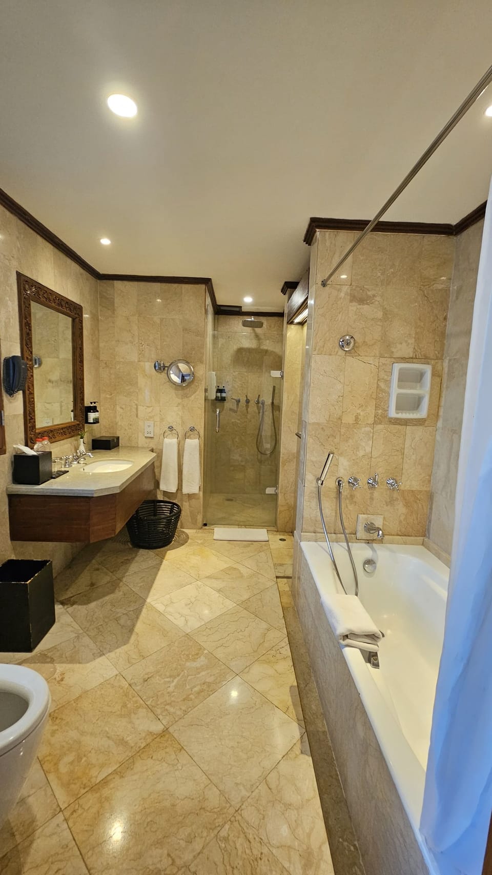 Shower, designer toiletries, hair dryer, bathrobes
