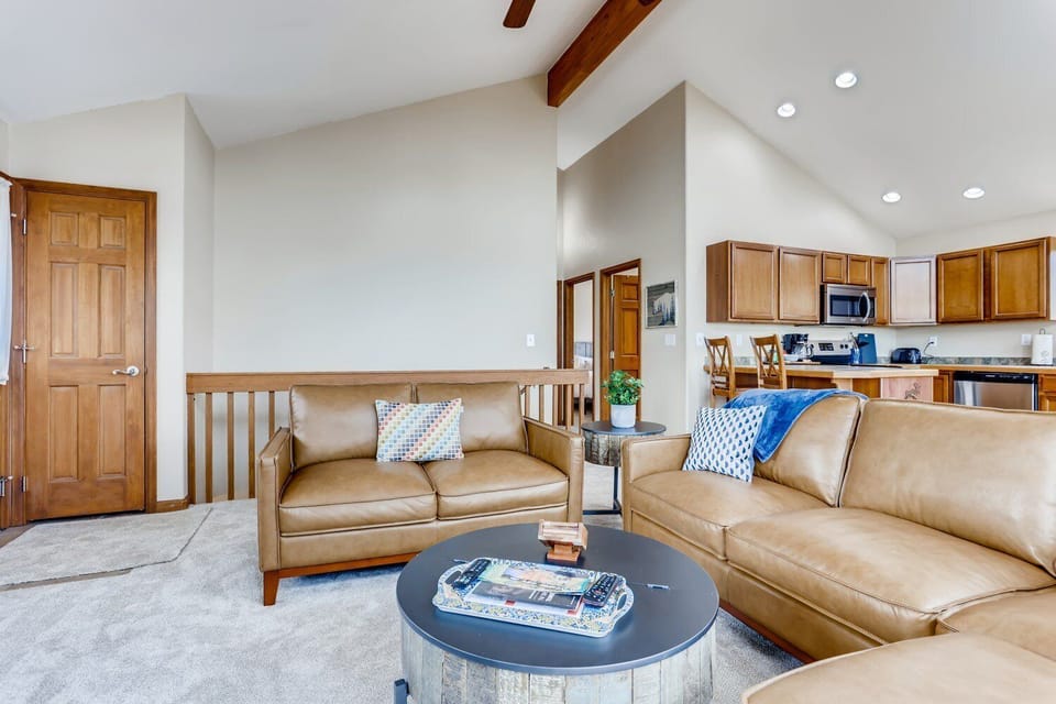 With an open kitchen and living area, you will not have to worry about missing the fun no matter where you are upstairs.