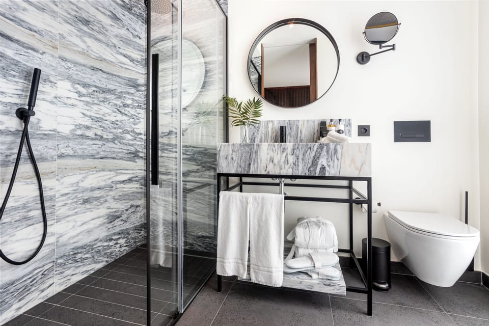 Shower, free toiletries, hair dryer, towels