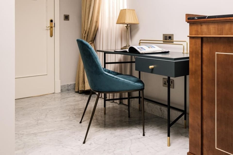 Deluxe Double or Twin Room | Minibar, in-room safe, desk, laptop workspace