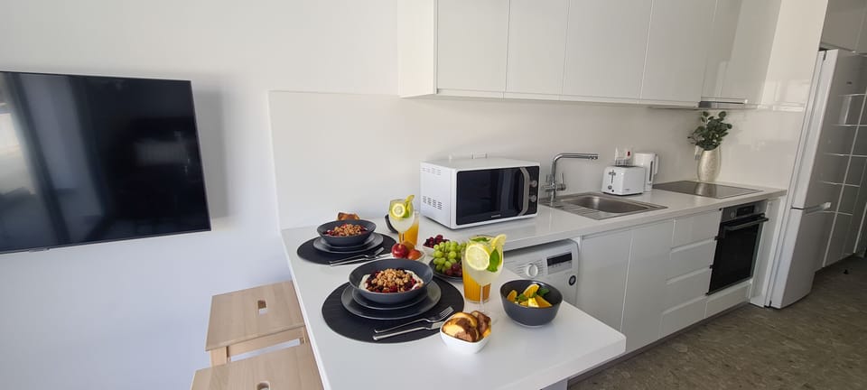 Luxury Studio | Private kitchen | Coffee/tea maker, dining tables