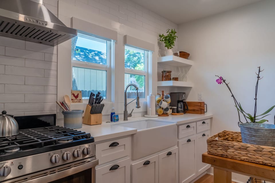 Gas Range and Farmhouse Style Sink