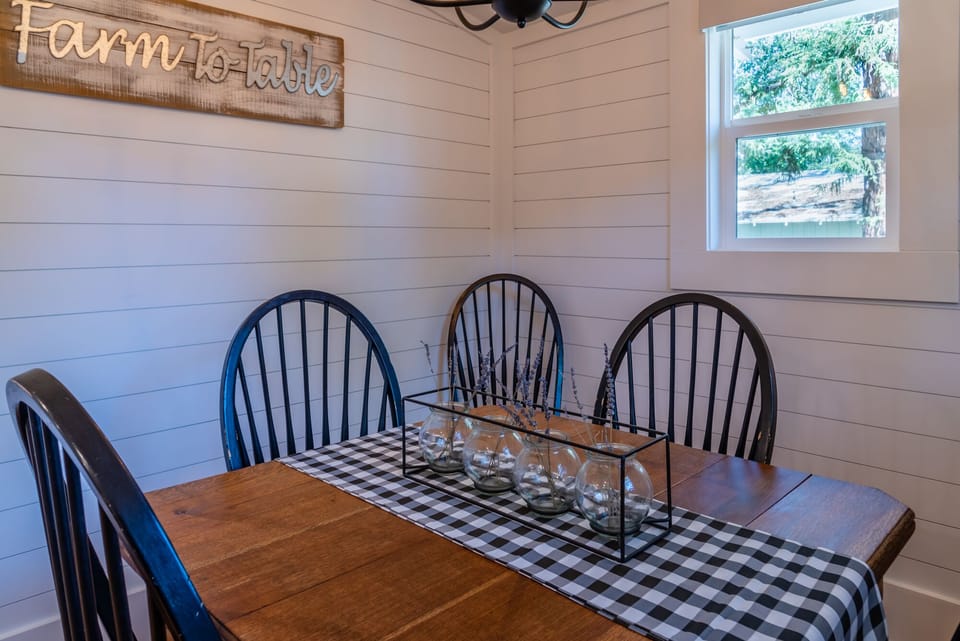 Gather at the checkered table for shared meals