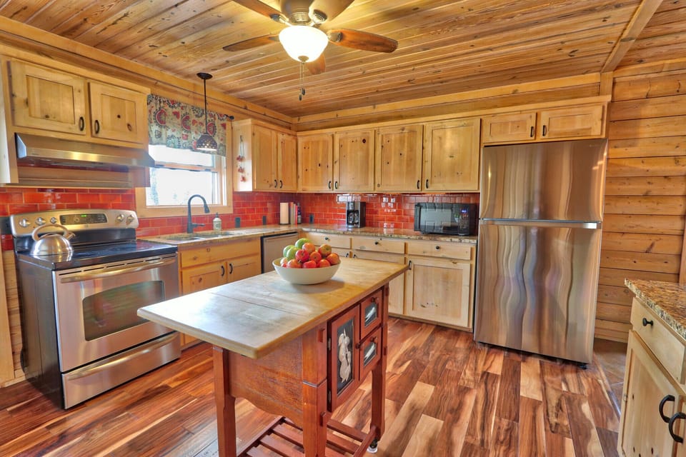 Full kitchen with stove, oven, dishwasher, refrigerator, and microwave