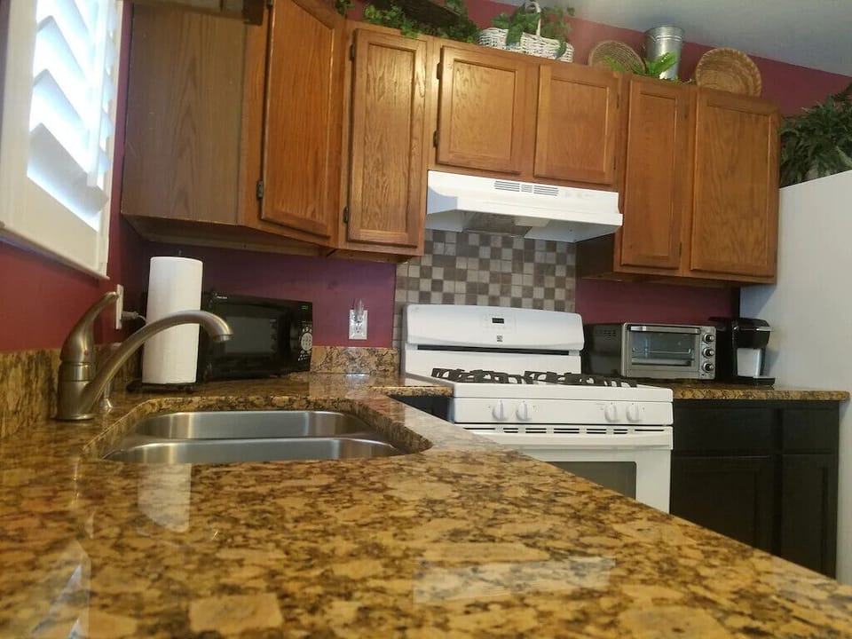Clean kitchen with all you need! Microwave, toaster, coffee pot, pots/pans