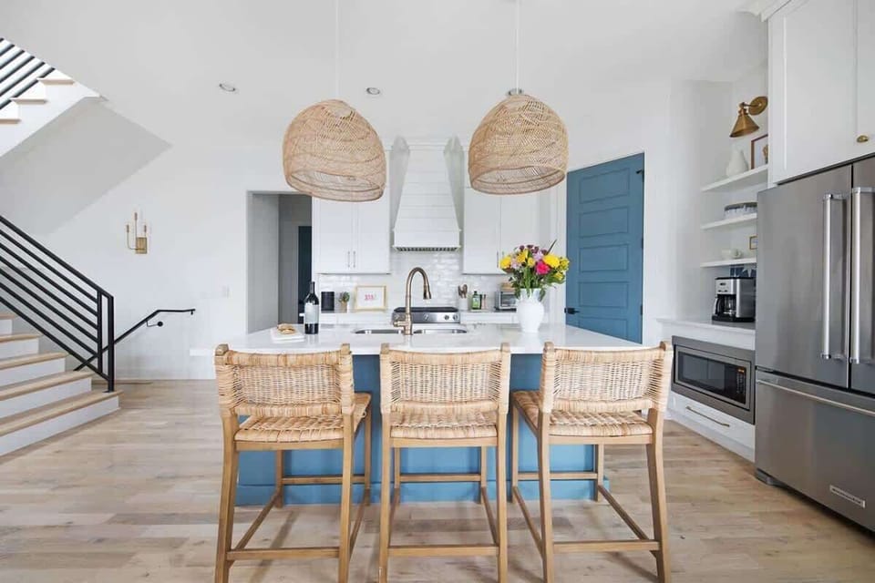 Modern Kitchen with Stainless Steel Appliances and Seating Counter
