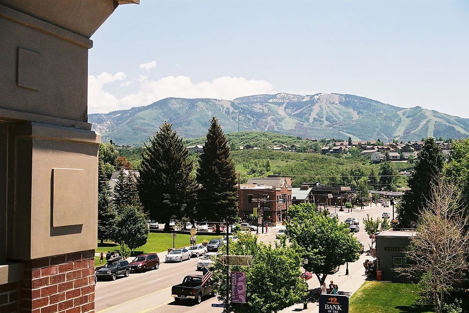 Mountain town view with ski slopes and downtown area visible from the property location.